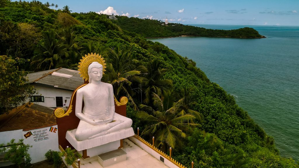 Buddha statue by the ocean in Sri Lanka 