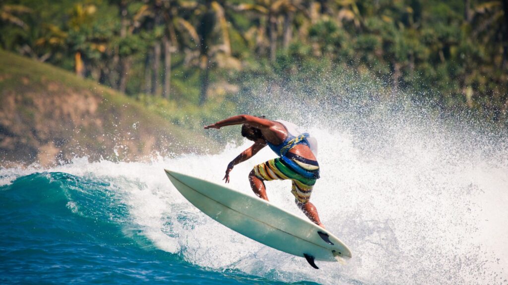 a picture of a surfer in arugam bay Sri lanka