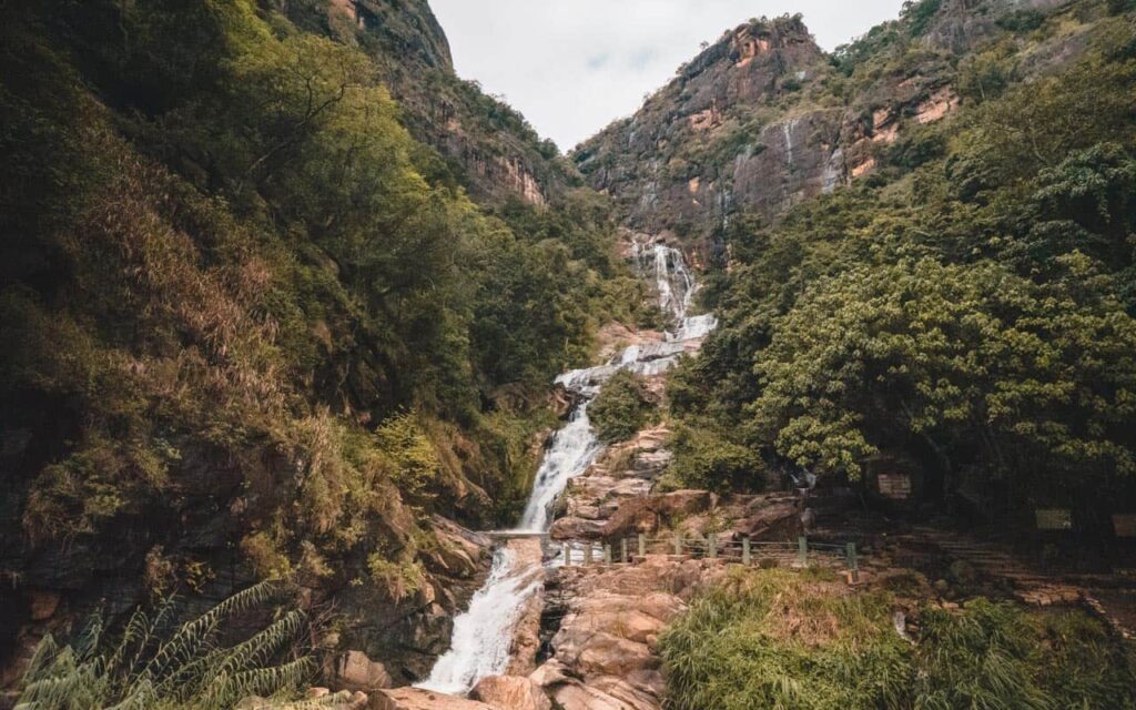 Ravana Falls from a close-up angle, showing the cascading water against the rock formations.