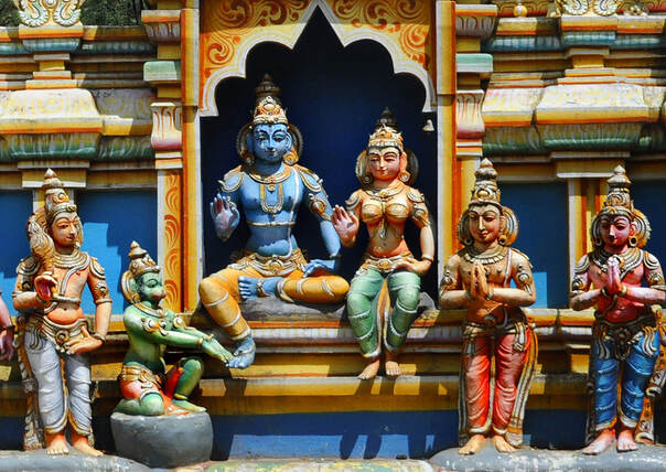 The vibrantly painted Seetha Amman Temple with intricate Hindu deities and carvings.